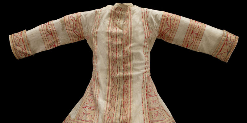 Traditional embroidered long-sleeve tunic garment