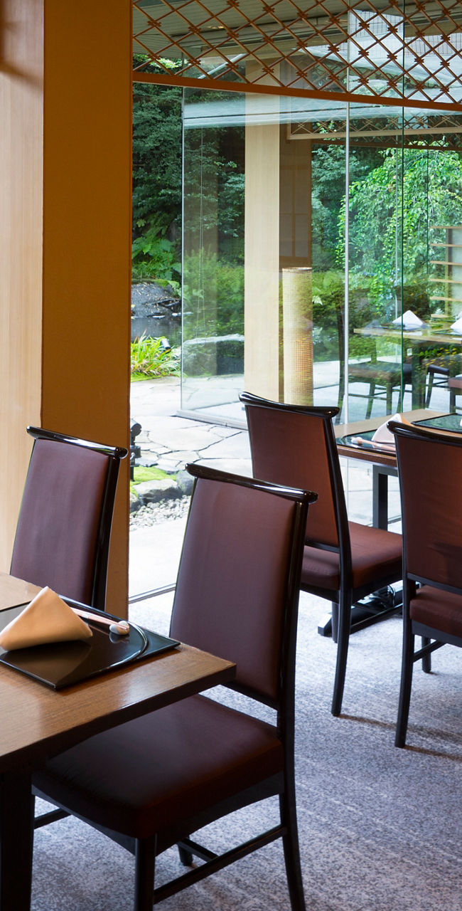 Elegant restaurant with garden view seating