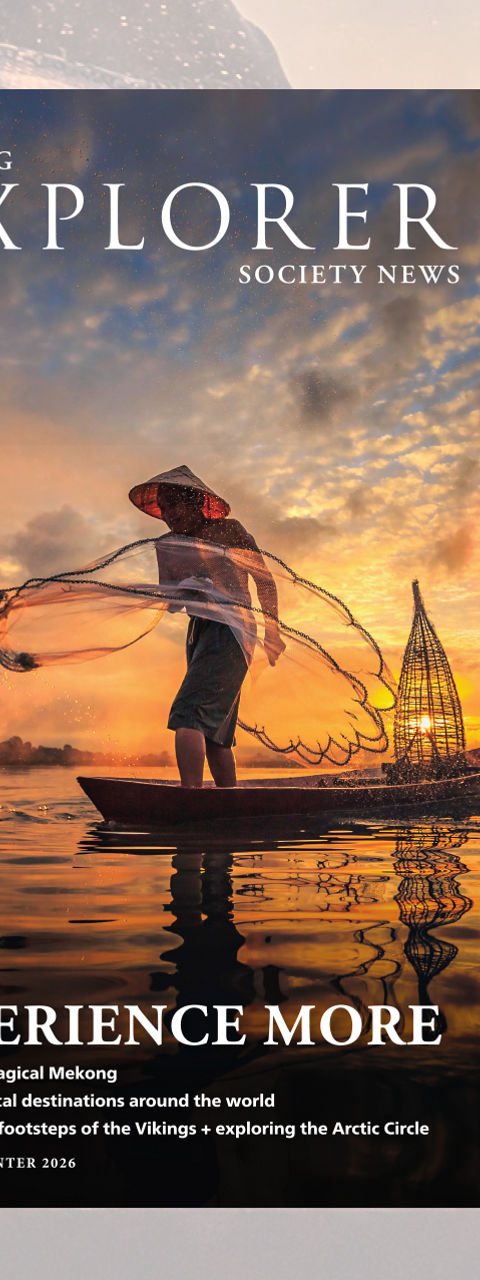 Fisherman casting net at golden sunrise
