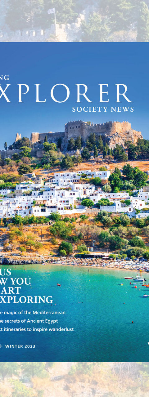 Travel Explorer Magazine Cover with Coastal Fortress View