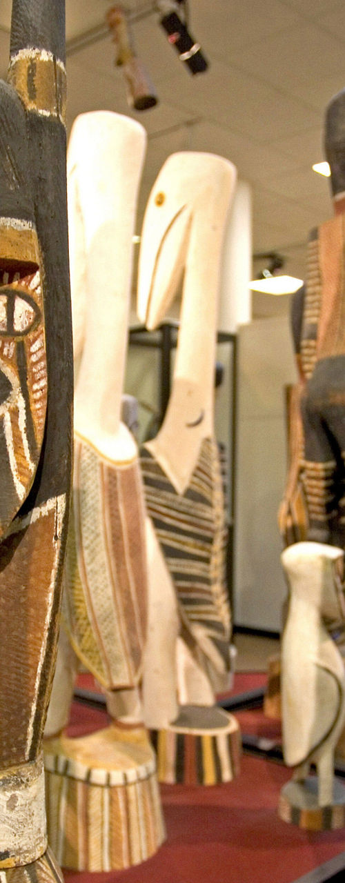 Traditional wooden sculptures in museum exhibit