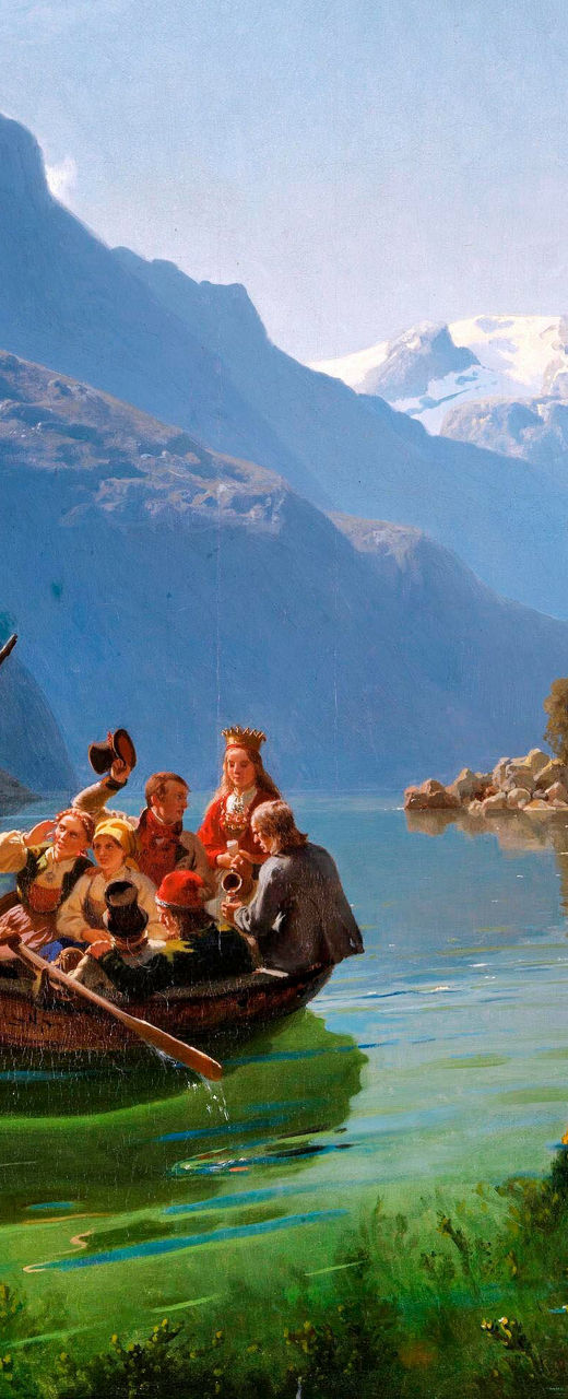 Group rowing boat in scenic mountain lake