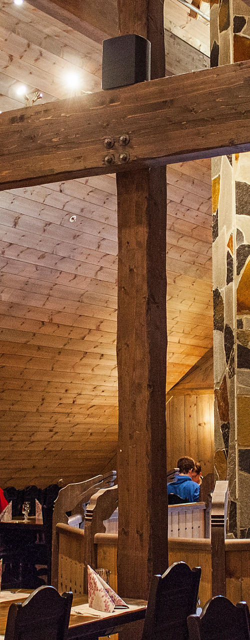 Rustic Wooden Restaurant Interior with Diners