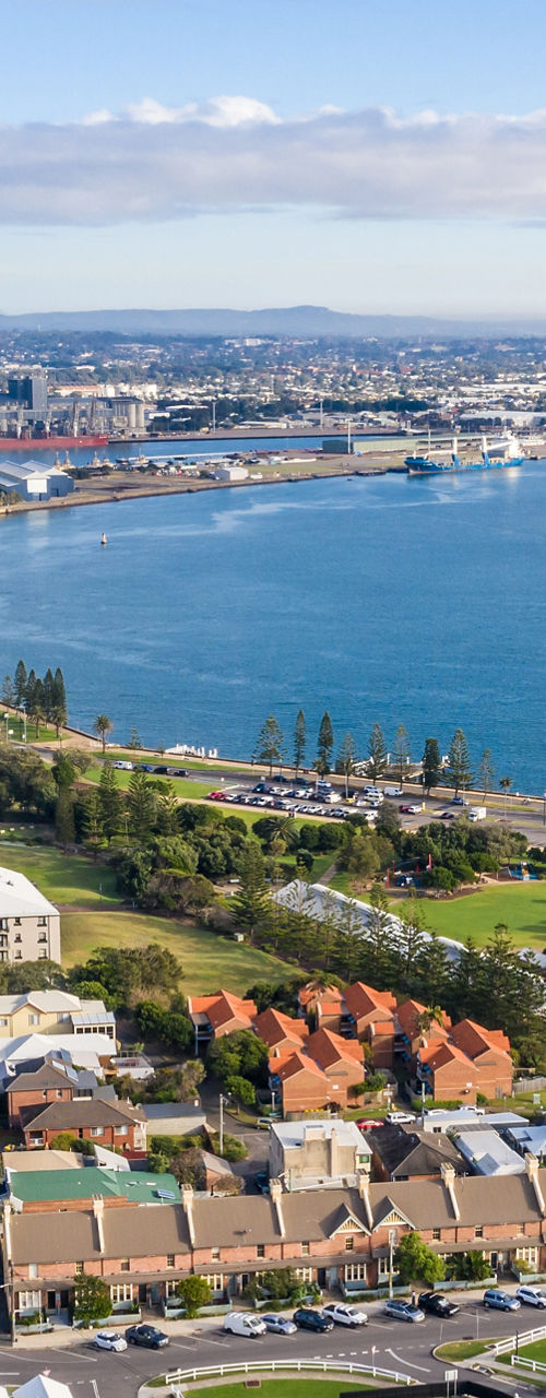 Aerial view of coastal city and harbor