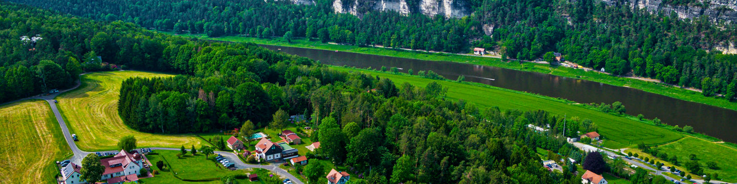 Scenic countryside with river and cliffs