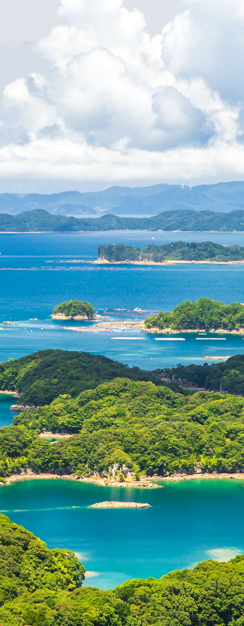 Scenic view of lush islands and blue waters