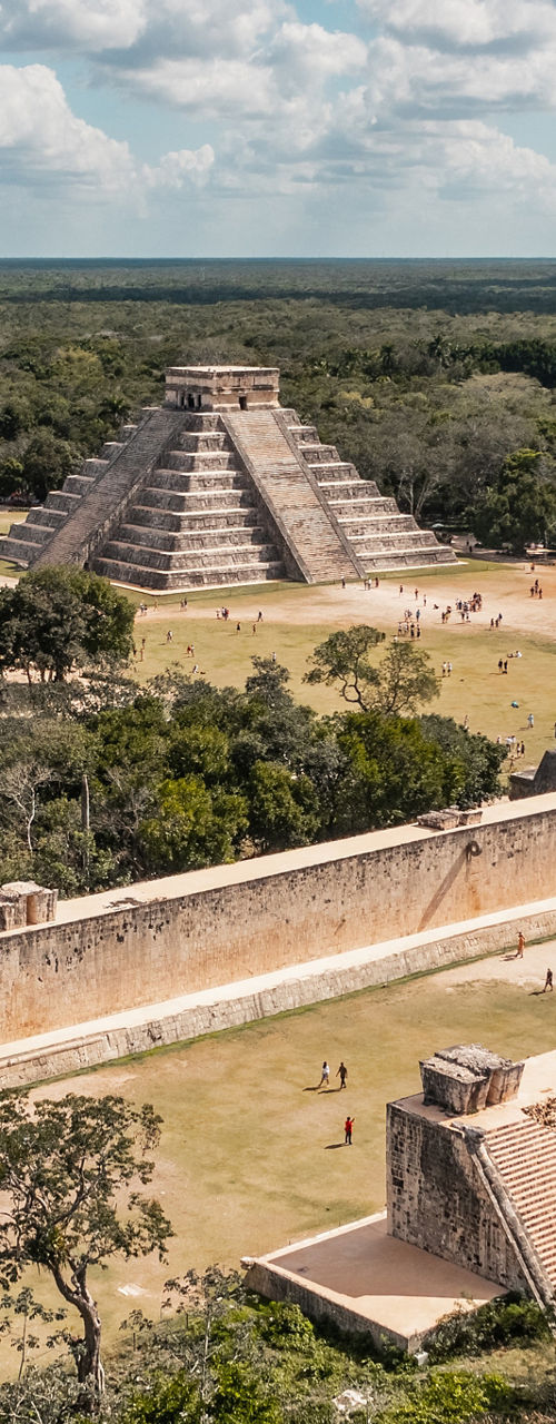Ancient Mayan Pyramid and Ball Court in Dense Jungle