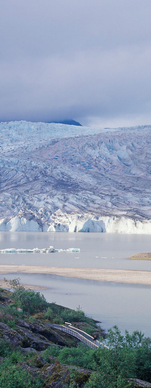 Scenic view of glacier and lake
