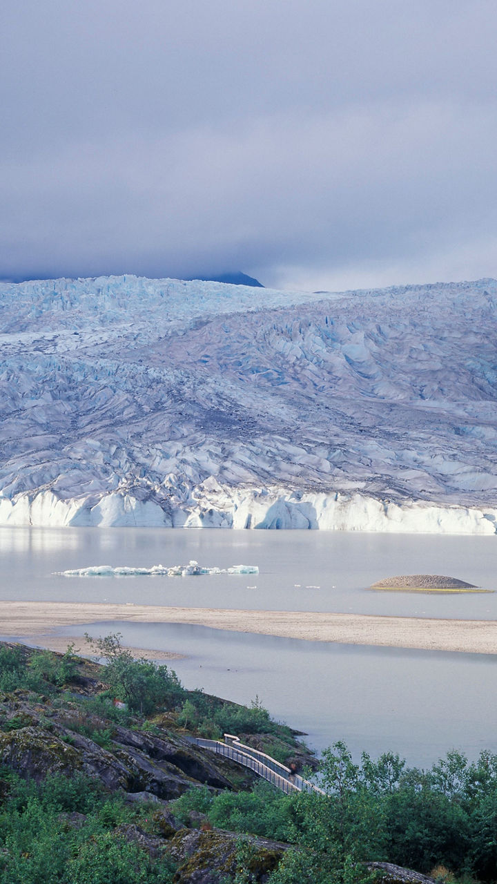 Scenic view of glacier and lake