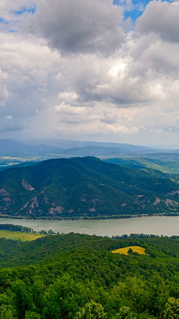 Wide panoramic view of winding river valley