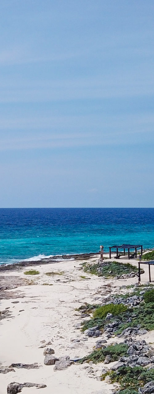 Coastal lighthouse with turquoise ocean view