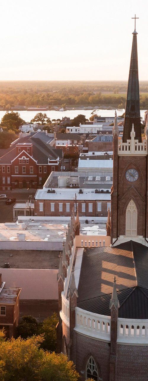 Aerial view of historic church at sunset
