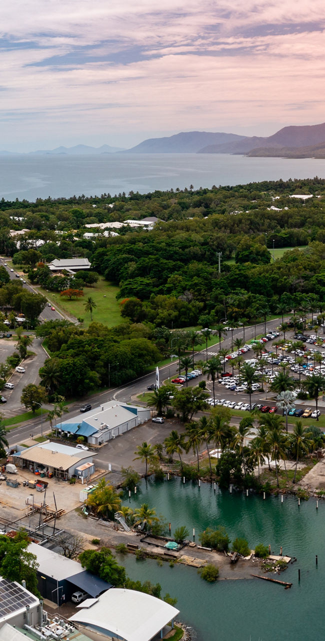 Aerial view of coastal marina and townscape