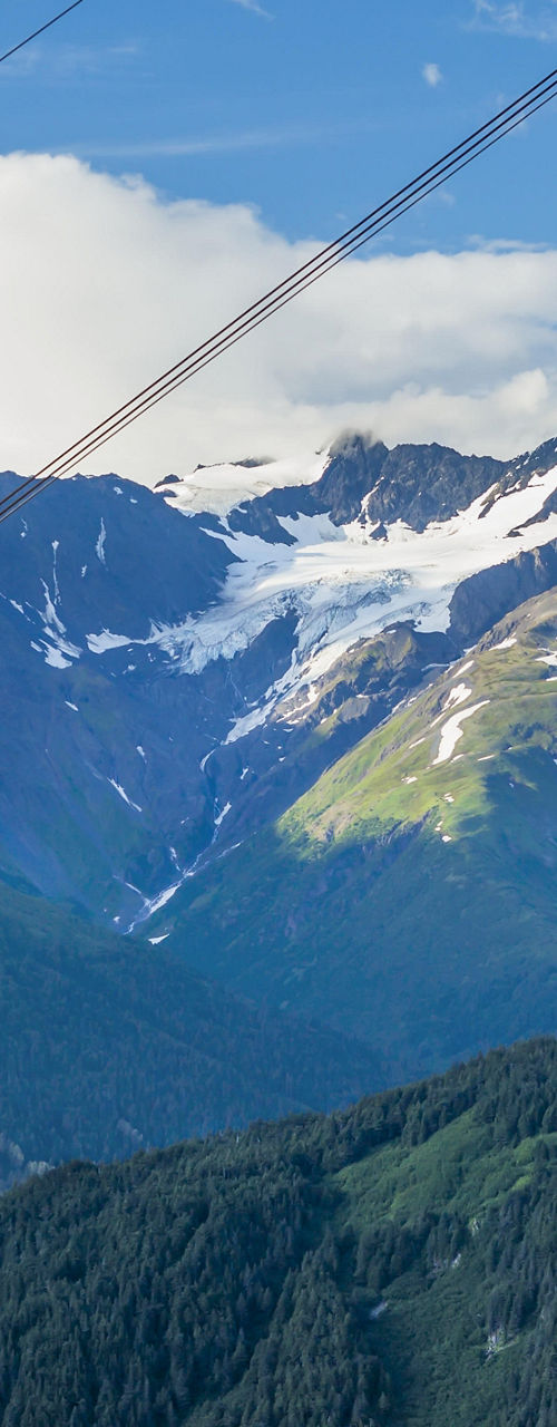 Cable car over scenic mountain landscape