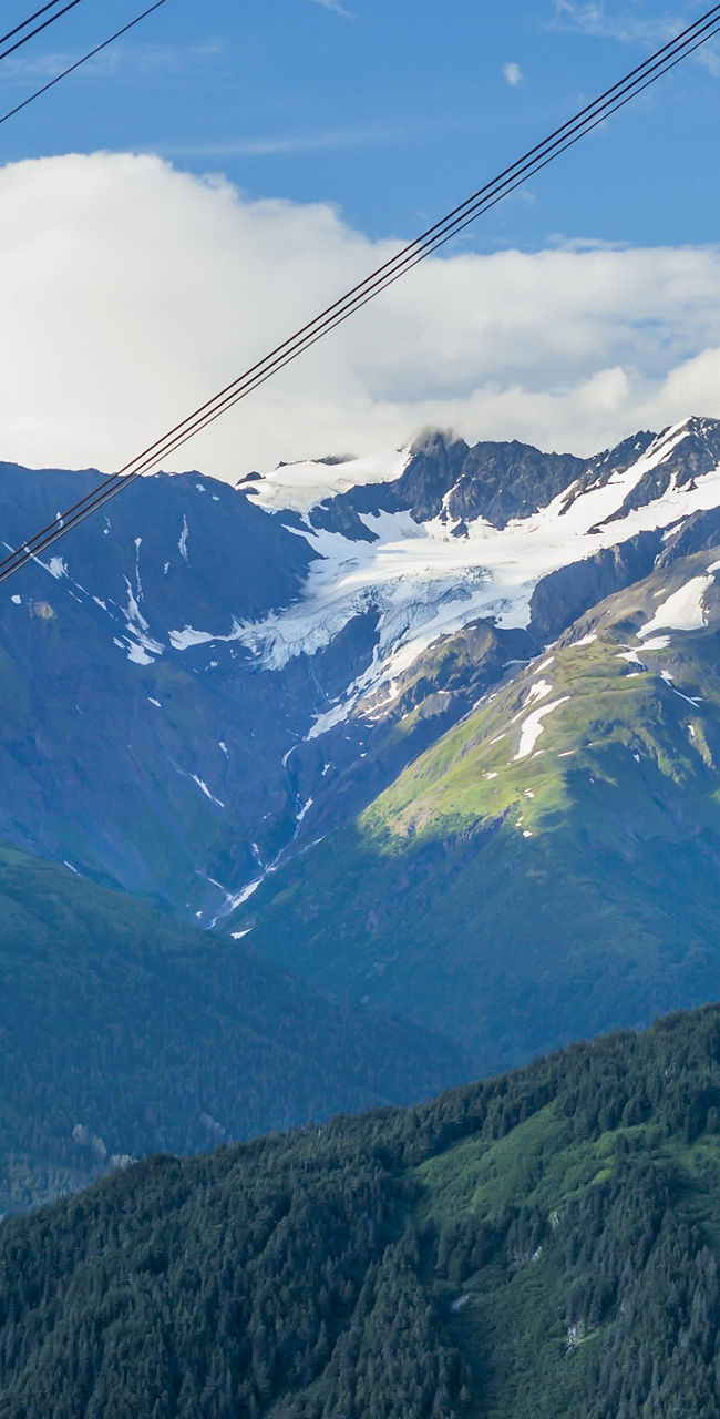Cable car over scenic mountain landscape