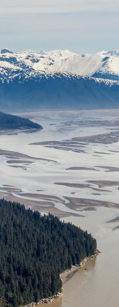 Aerial view of snowy mountains and river