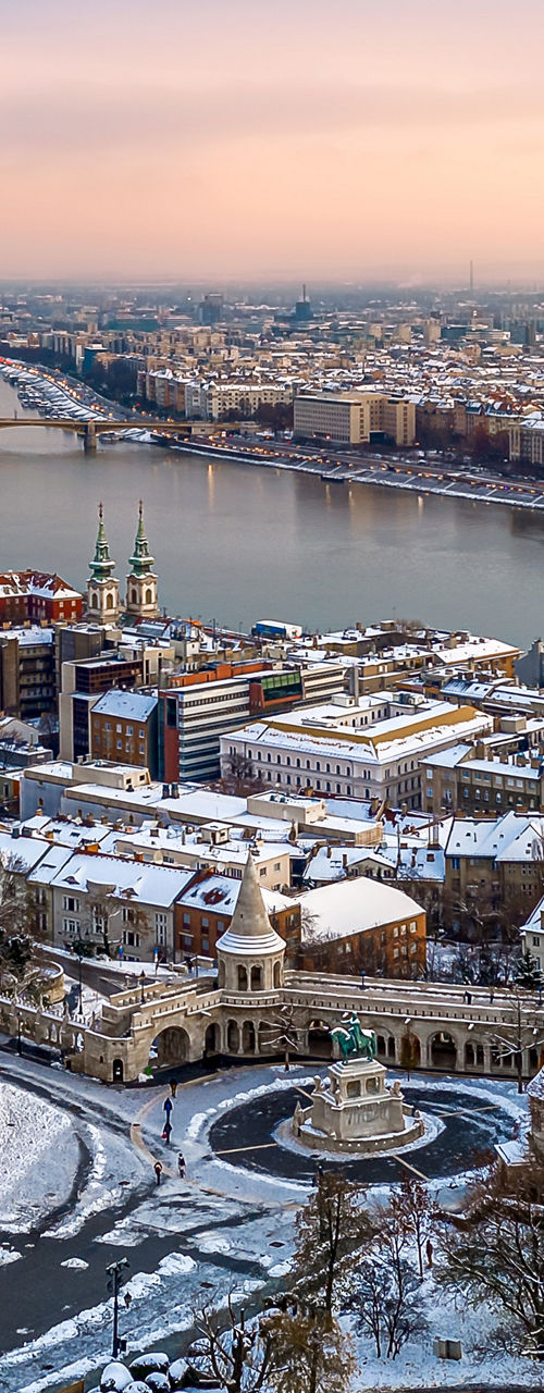 Snowy Budapest cityscape with historic church