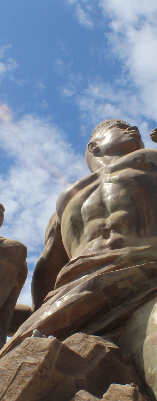 Majestic African Renaissance Monument under blue sky
