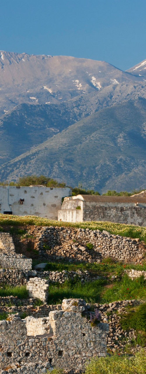 Historic ruins with mountain backdrop