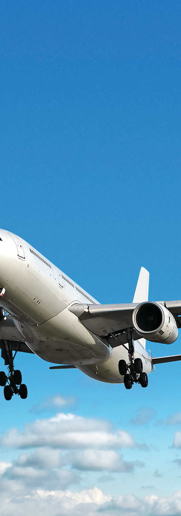Commercial airplane flying in clear sky