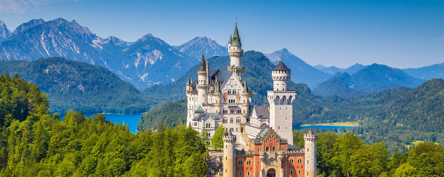 Neuschwanstein Castle in scenic mountain setting