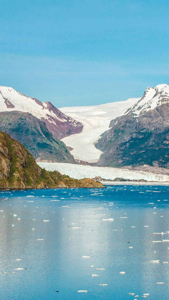 Scenic glacier view with icy lake