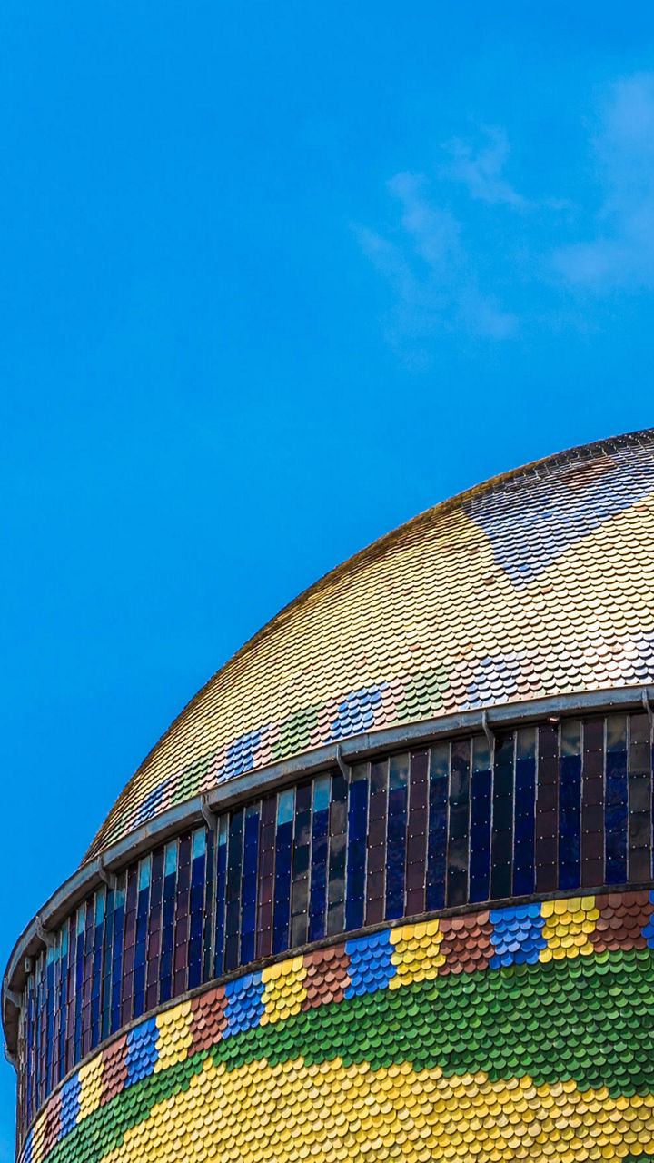 Colorful dome of historic building under blue sky