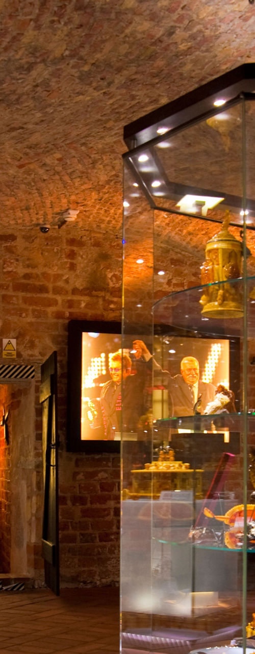 Museum exhibit of ornate gold artifacts