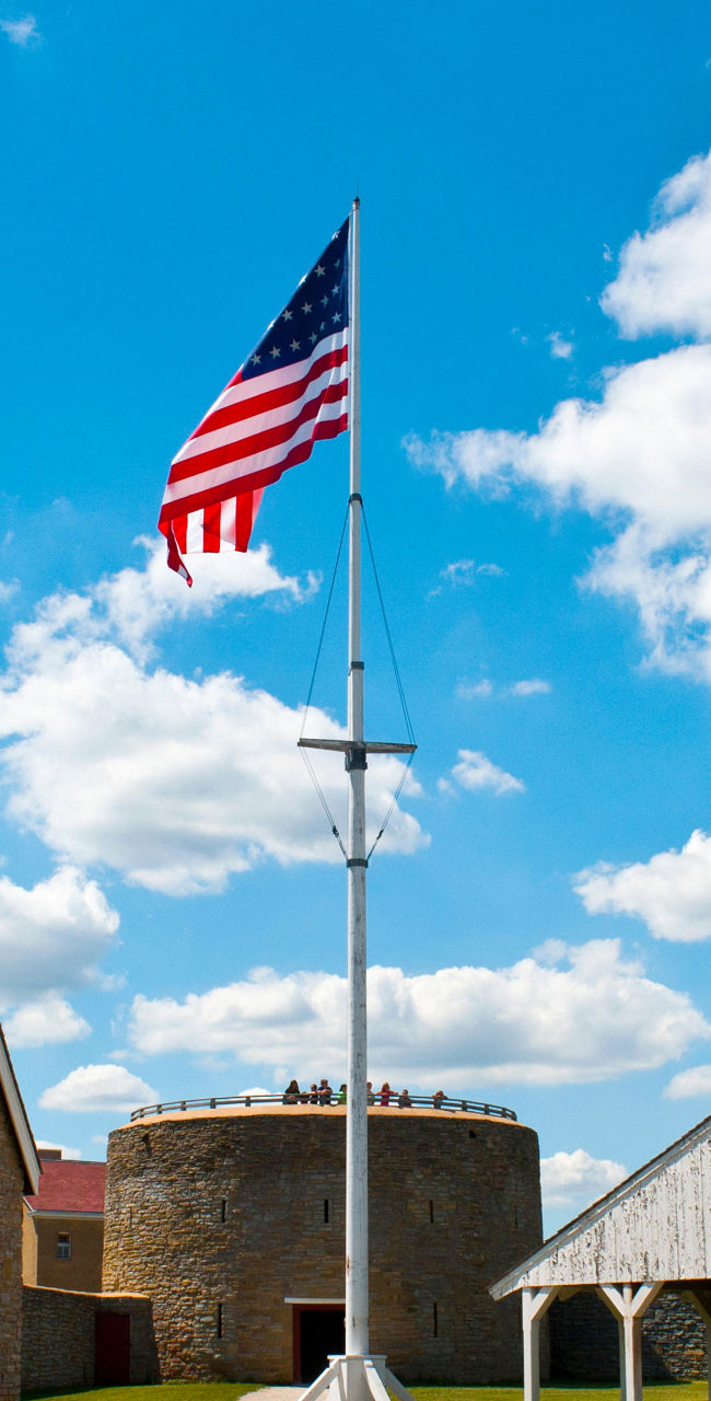Historic fort with American flag flying