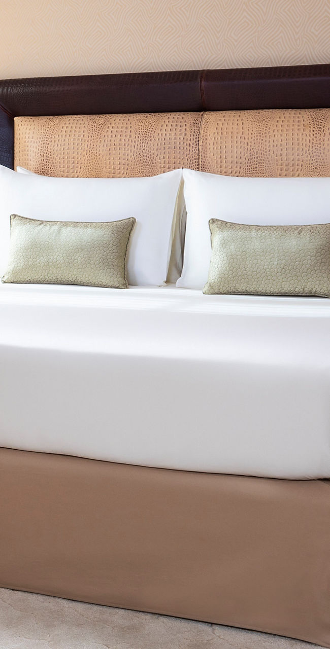 Elegant hotel room with king-size bed
