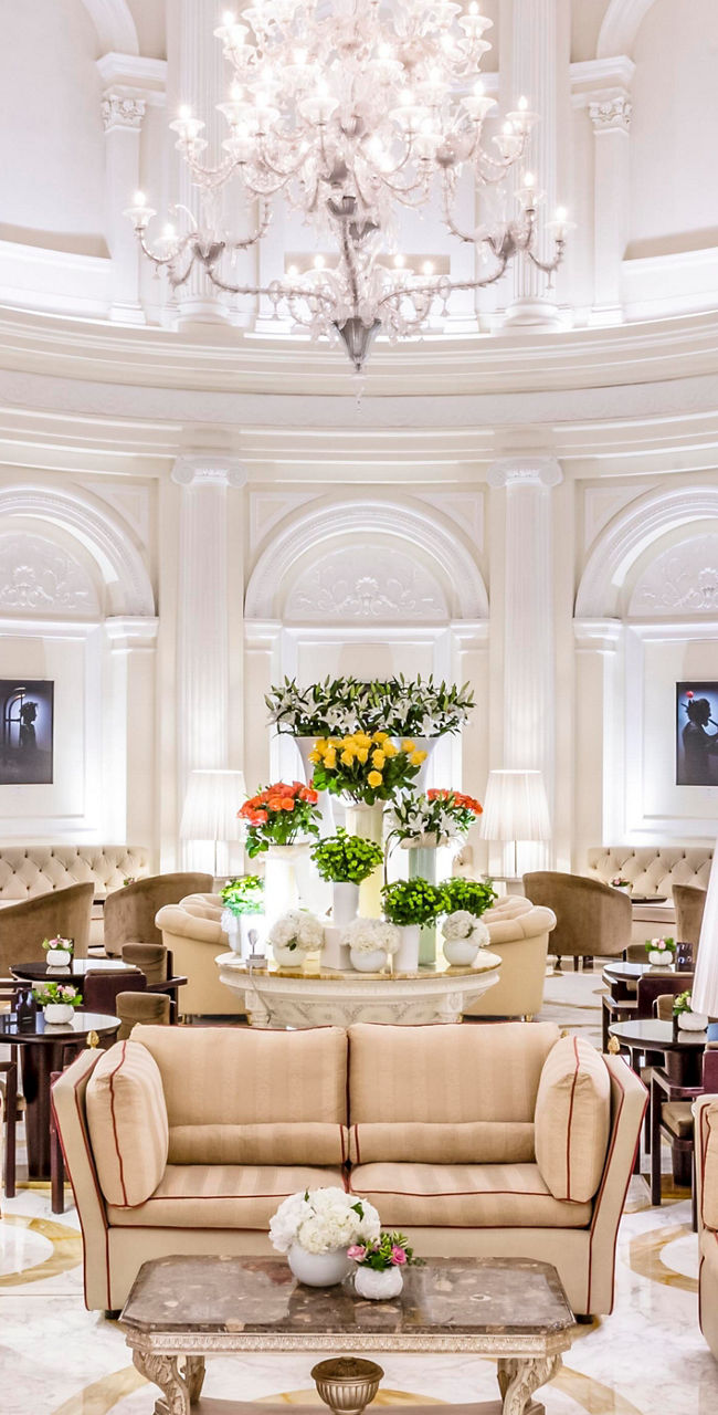 Elegant hotel lobby with grand chandelier