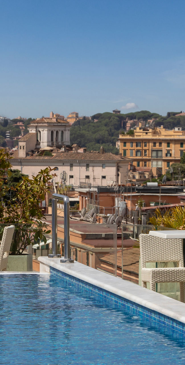 Rooftop pool with cityscape view