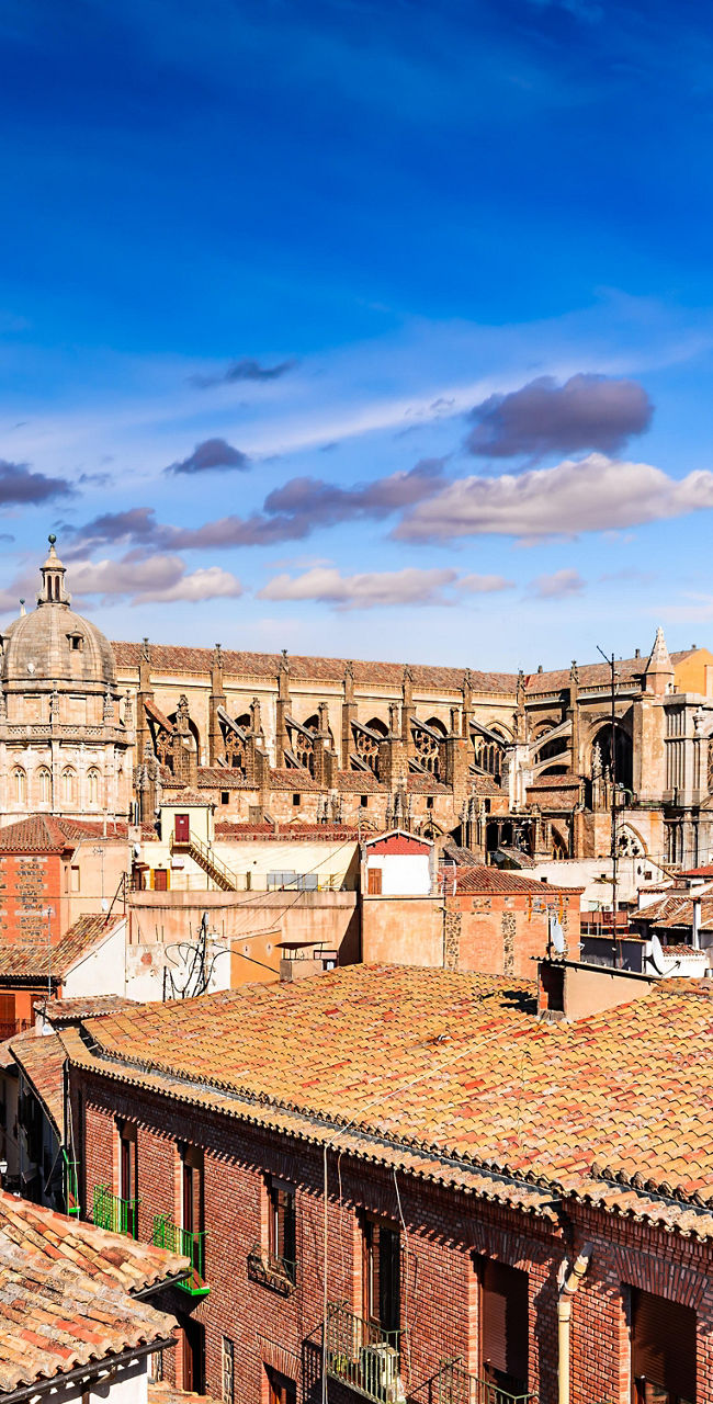 Historic rooftops and landmarks in Toledo, Spain