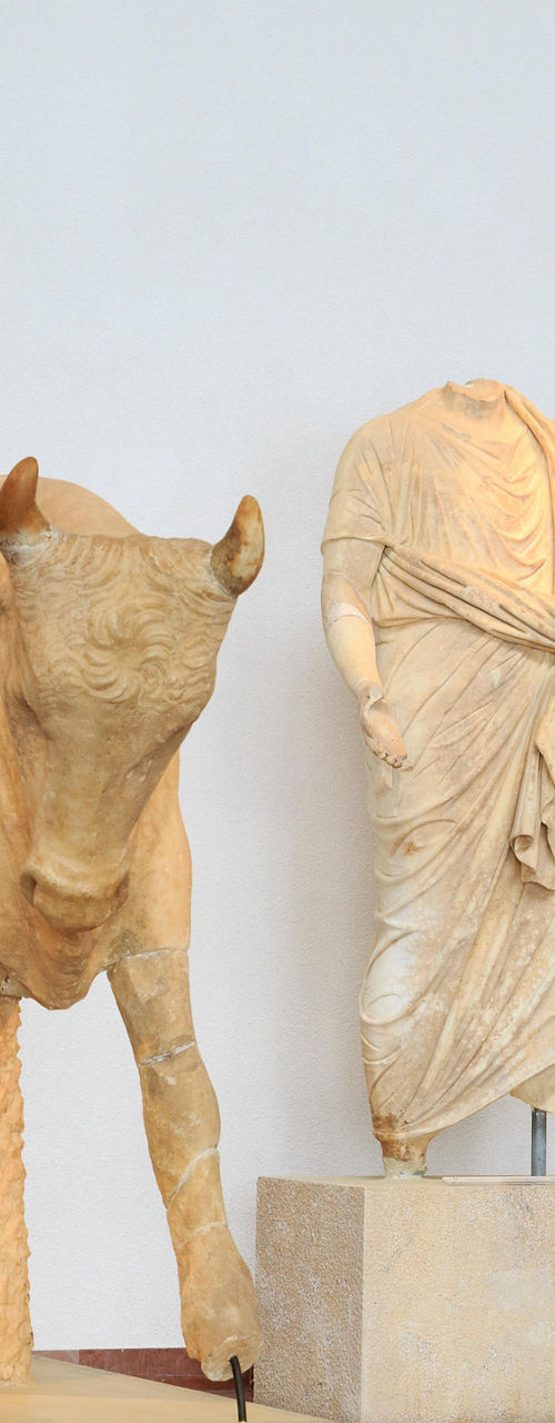 Ancient sculptures in museum gallery