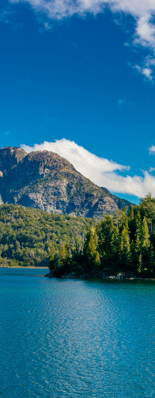 Scenic mountain lake with clear blue skies