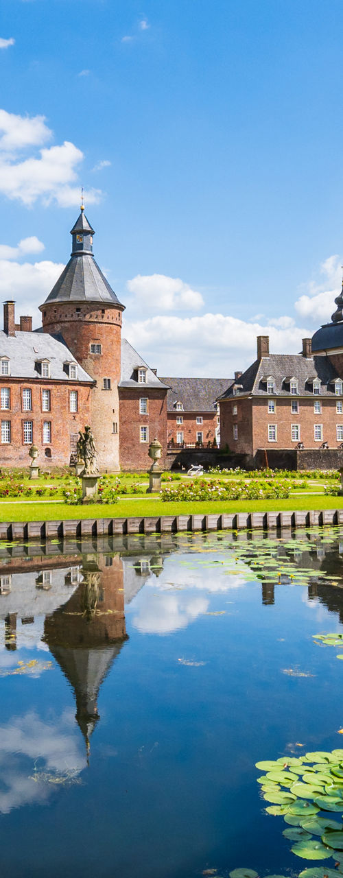 Historic castle with moat and gardens