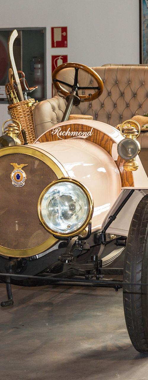 Vintage car in museum with period decor