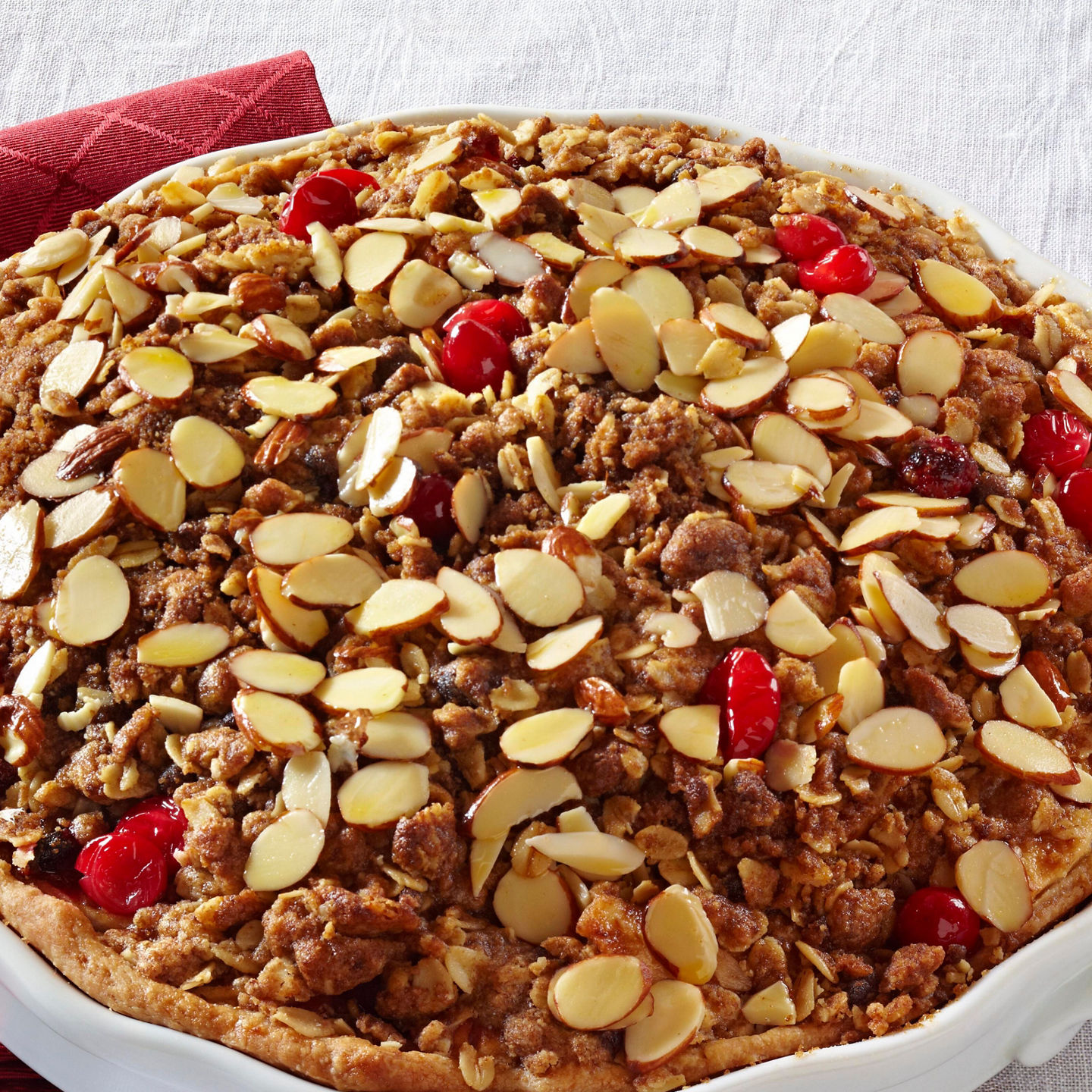 Cherry almond dessert in white dish