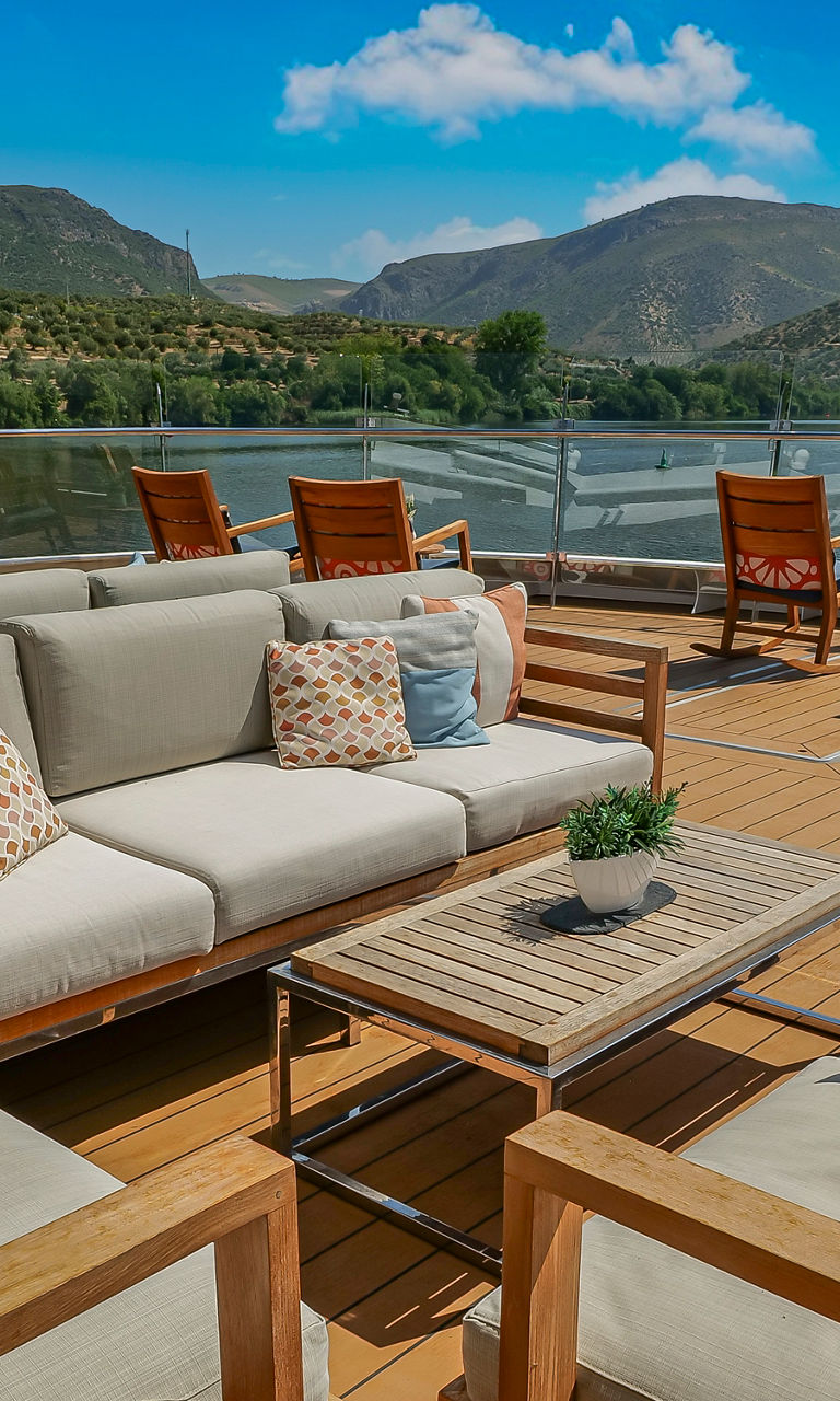 Outdoor lounge with scenic mountain view