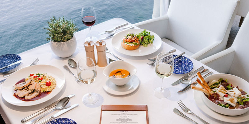 Elegant waterfront dining with gourmet dishes