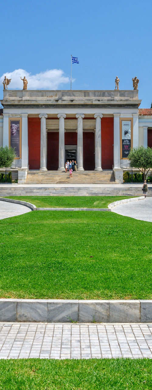 Neoclassical museum with lush green gardens