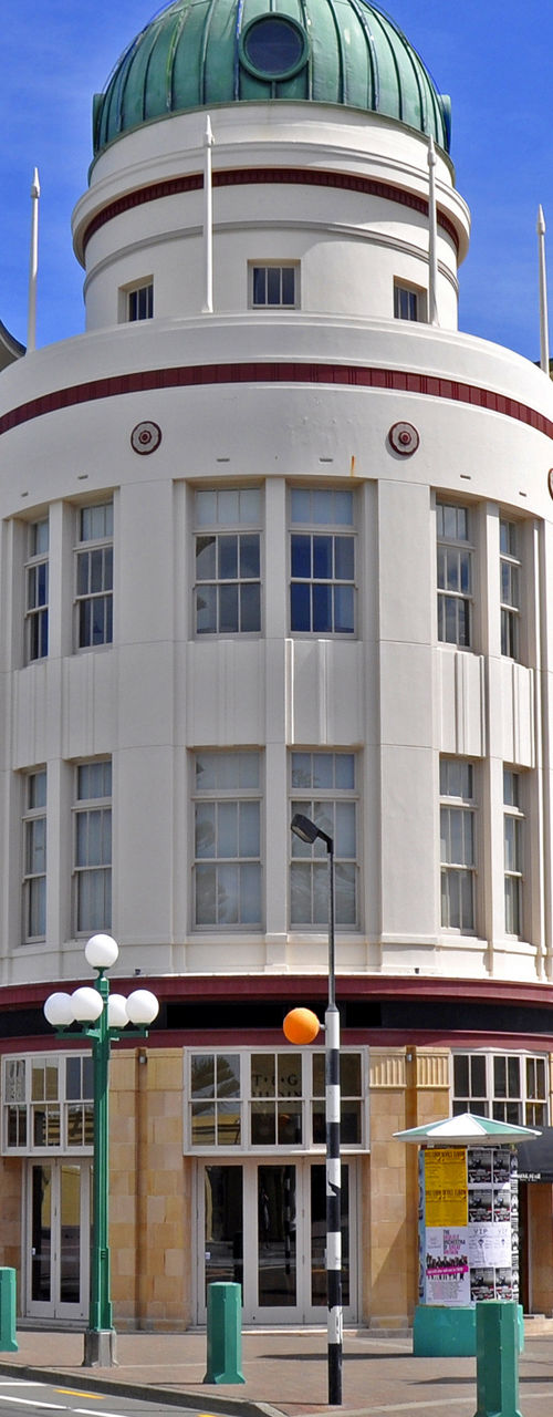 Historic art deco building on sunny street