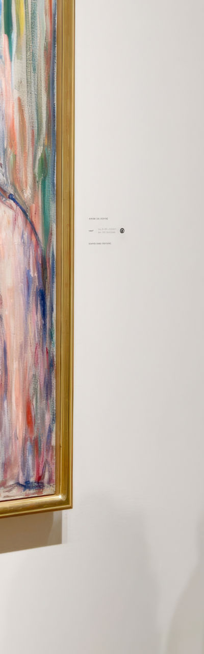 Art gallery visitor near abstract painting