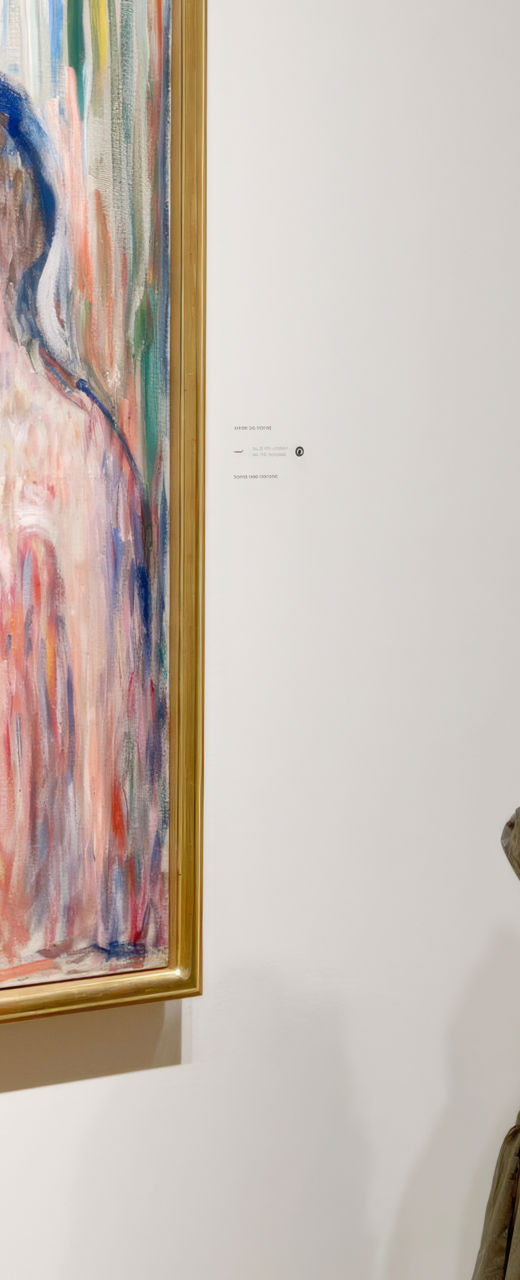 Art gallery visitor near abstract painting