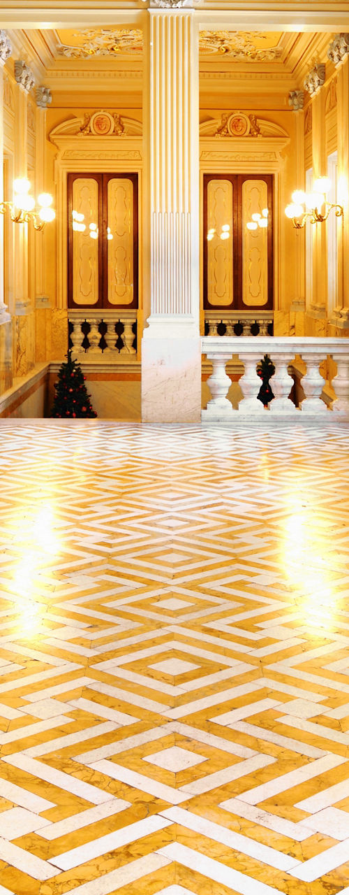 Elegant hallway with ornate ceiling fresco