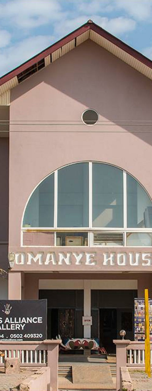 Omanye House exterior with art banners