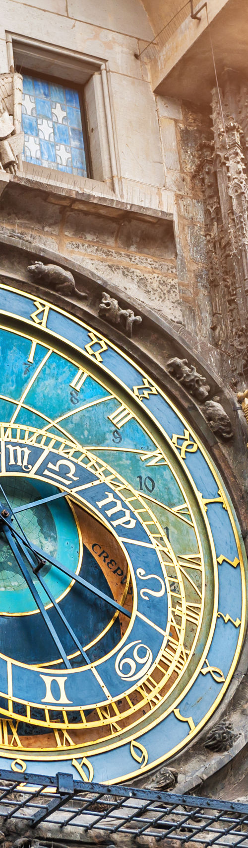 Historic astronomical clock in Prague sunlight
