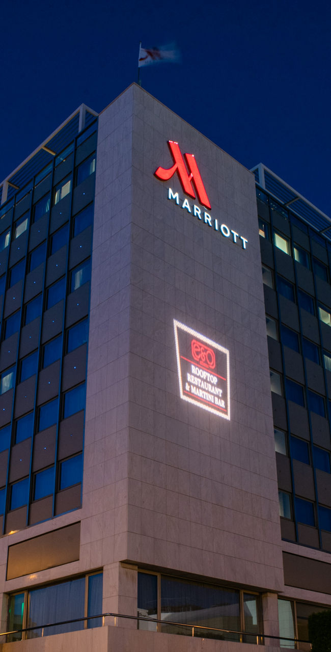 Modern hotel building at night