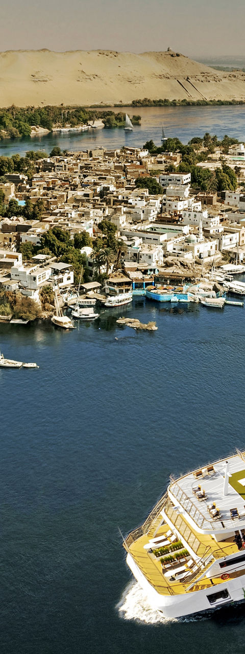 Luxury cruise ship on scenic river