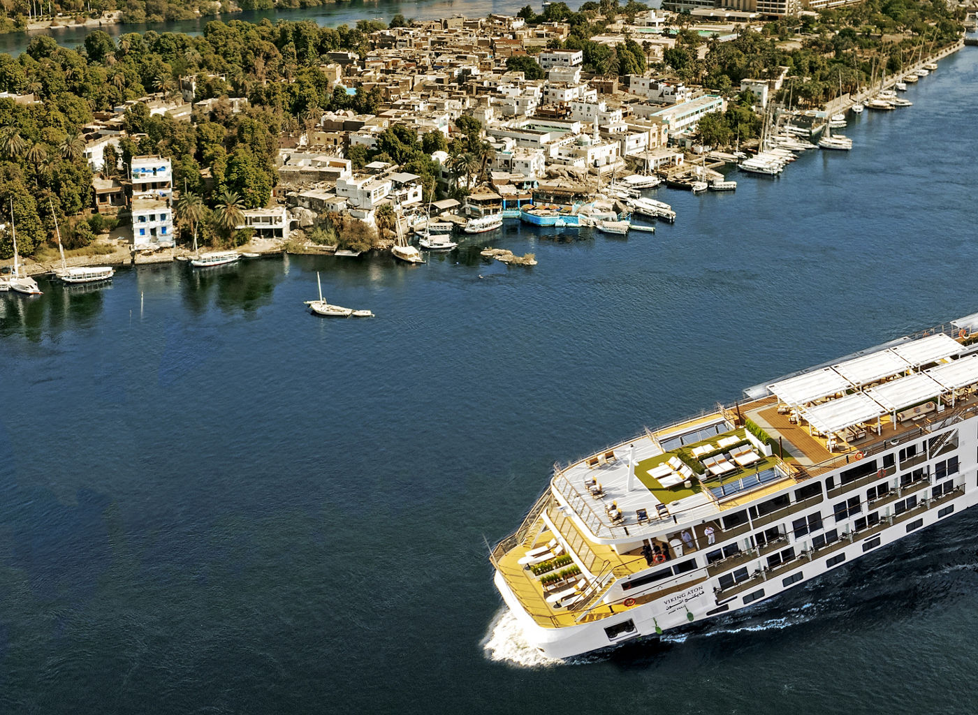 Luxury cruise ship on scenic river